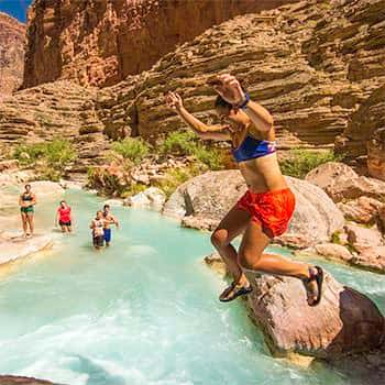 Jumping into Ruby Pools Havasu Creek