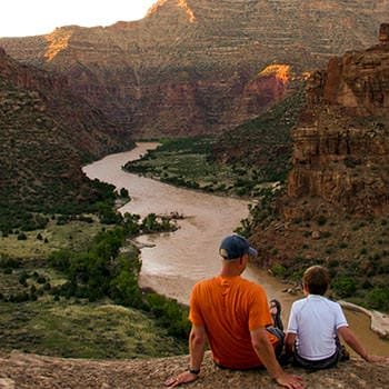 Father and son gazing down on the canyon
