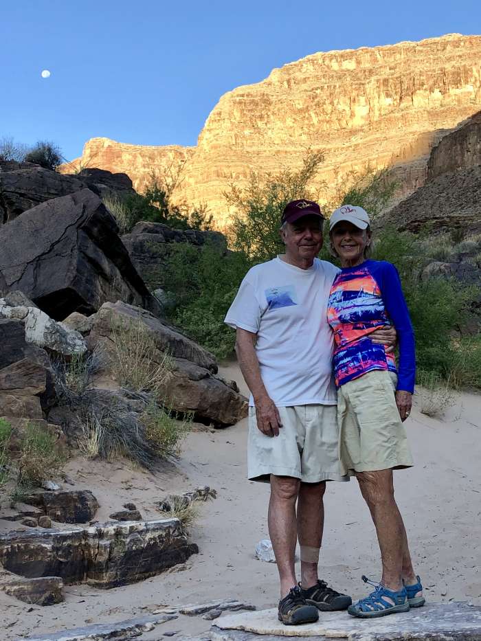 Grand Canyon Wall Behind Elderly Couple